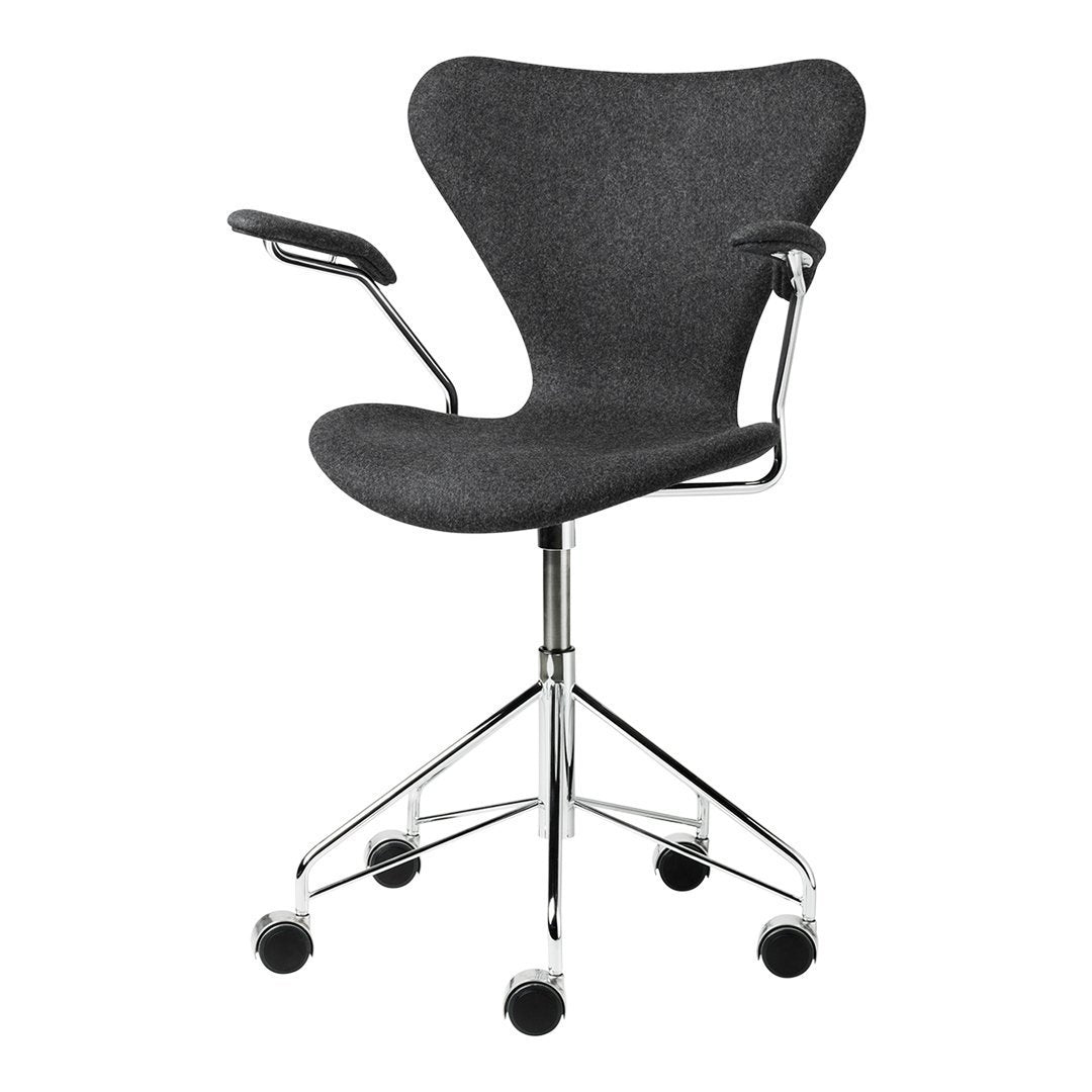 Stylish black desk chair with smooth curves and chrome accents, featuring a textured fabric pattern. Perfect for modern offices.