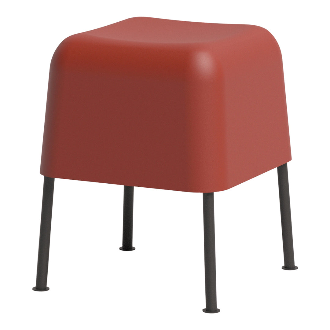 Red solid cube stool with sleek black legs, perfect for modern decor.