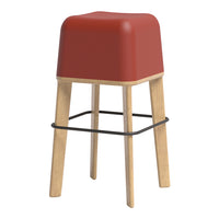 Red square-top stool with natural wood legs and a black support ring. Elegant design for modern interiors.