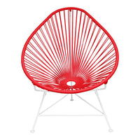 Red Acapulco chair with a unique radial pattern and sleek white metal legs, perfect for modern decor.