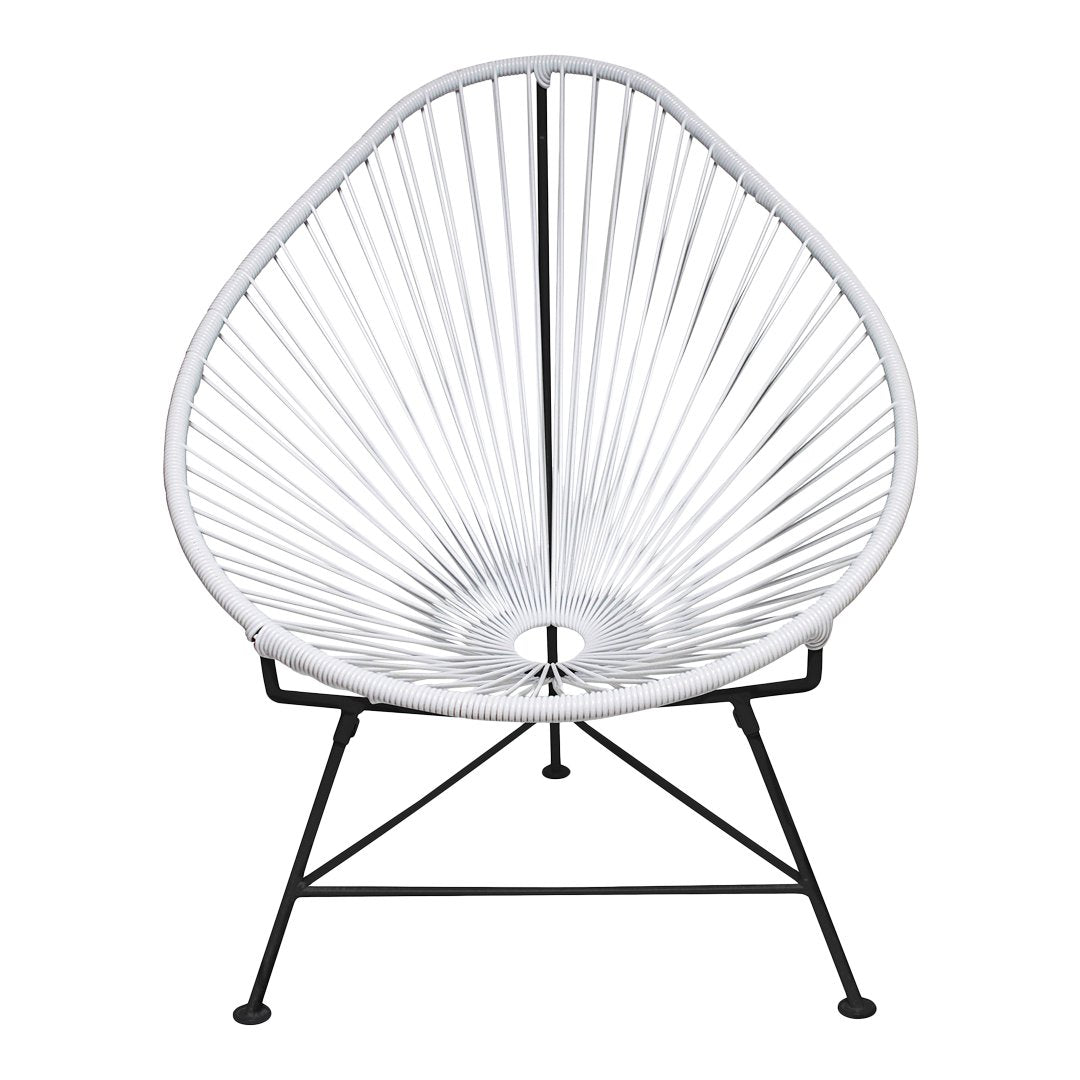 White woven chair with radial pattern on a black metal frame, showcasing modern and minimalist design.