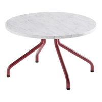 Round coffee table with a white marble top and a red metal base. Sleek and modern design featuring contrasting colors.