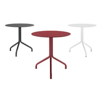 Set of three round tables in black, red, and white with sleek, minimalist designs and smooth surfaces.