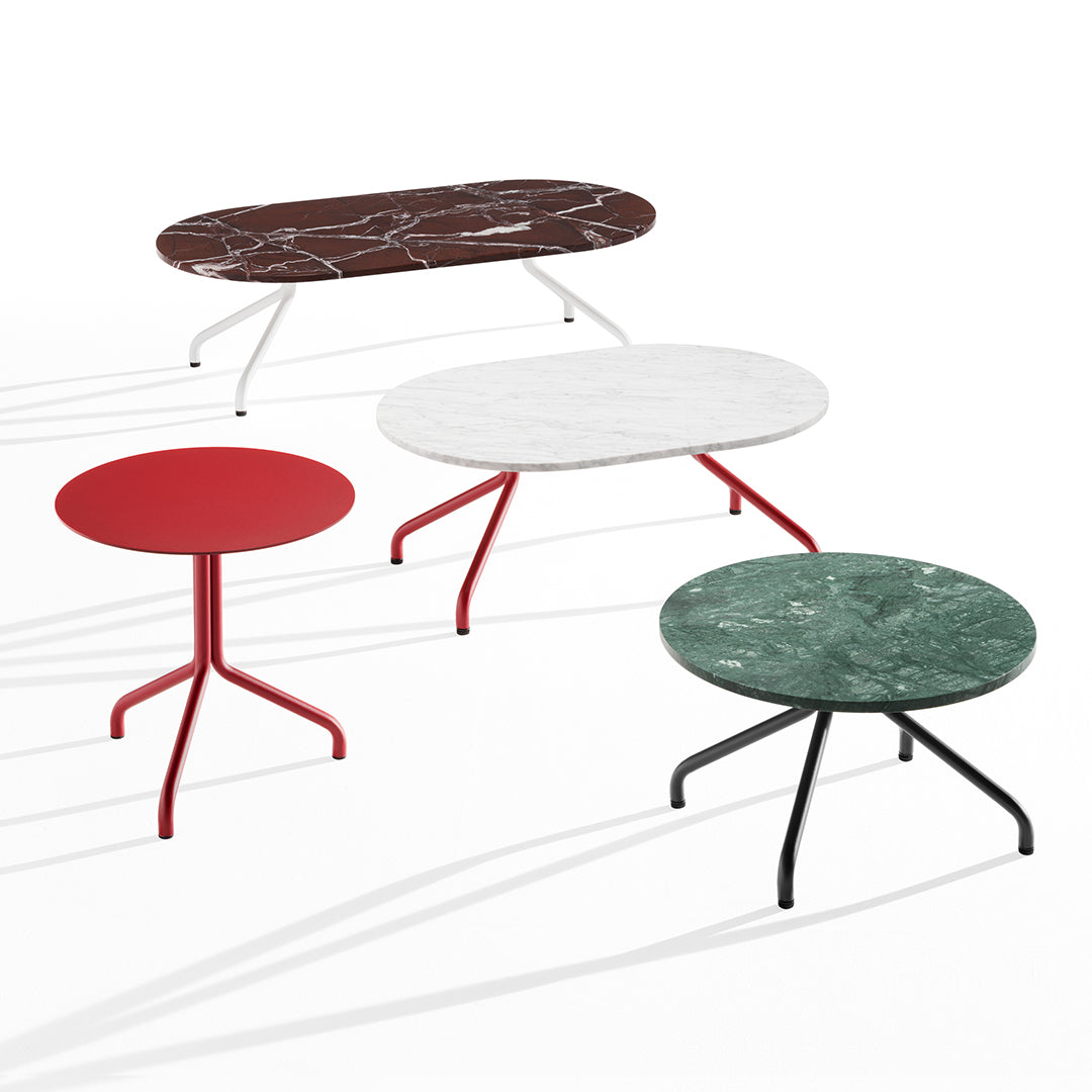"Four modern tables featuring red, green, white, and brown marble patterns with sleek metal bases."