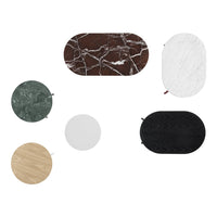Assorted tabletop designs featuring brown and white marble, green stone, black, white, and natural wood patterns.