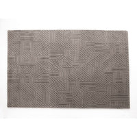 Gray geometric patterned rug with intricate line designs. Stylish and modern home decor accent.
