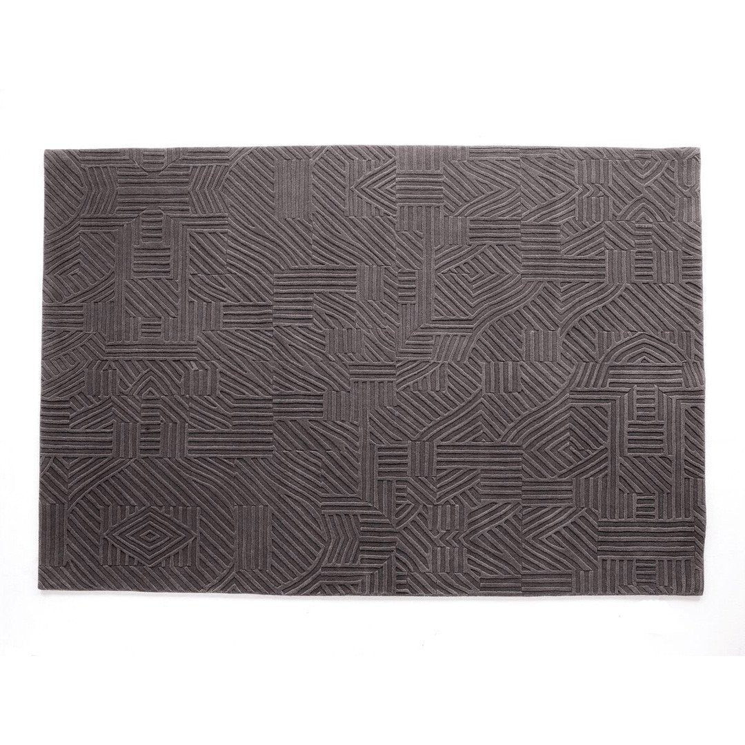 Dark gray rectangular rug featuring a modern, geometric pattern with textured lines. Perfect for contemporary decor.