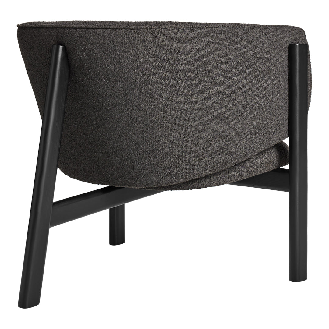 Modern black chair with a textured dark gray fabric, featuring sleek wooden legs for a stylish look.