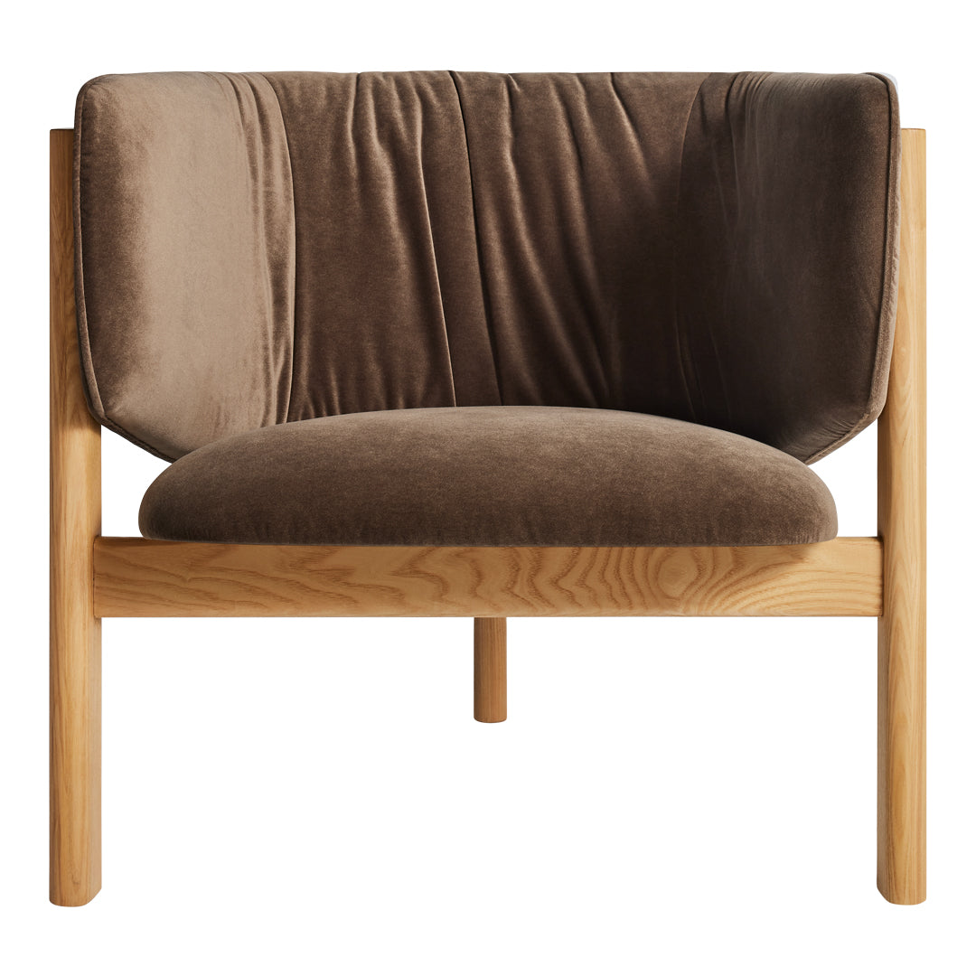 Brown velvet accent chair with vertical pleats and natural wood frame, perfect for modern living spaces.