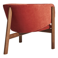 Rust orange fabric chair with smooth contours and natural wood legs, perfect for modern decor.