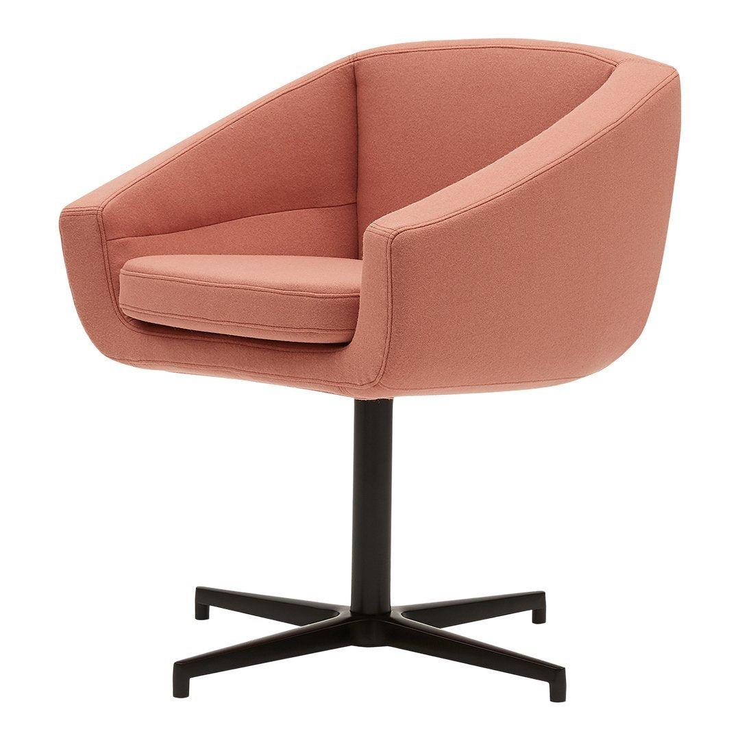 Blush pink armchair with a sleek black metal base, featuring a smooth, minimalist design. Perfect for modern decor.
