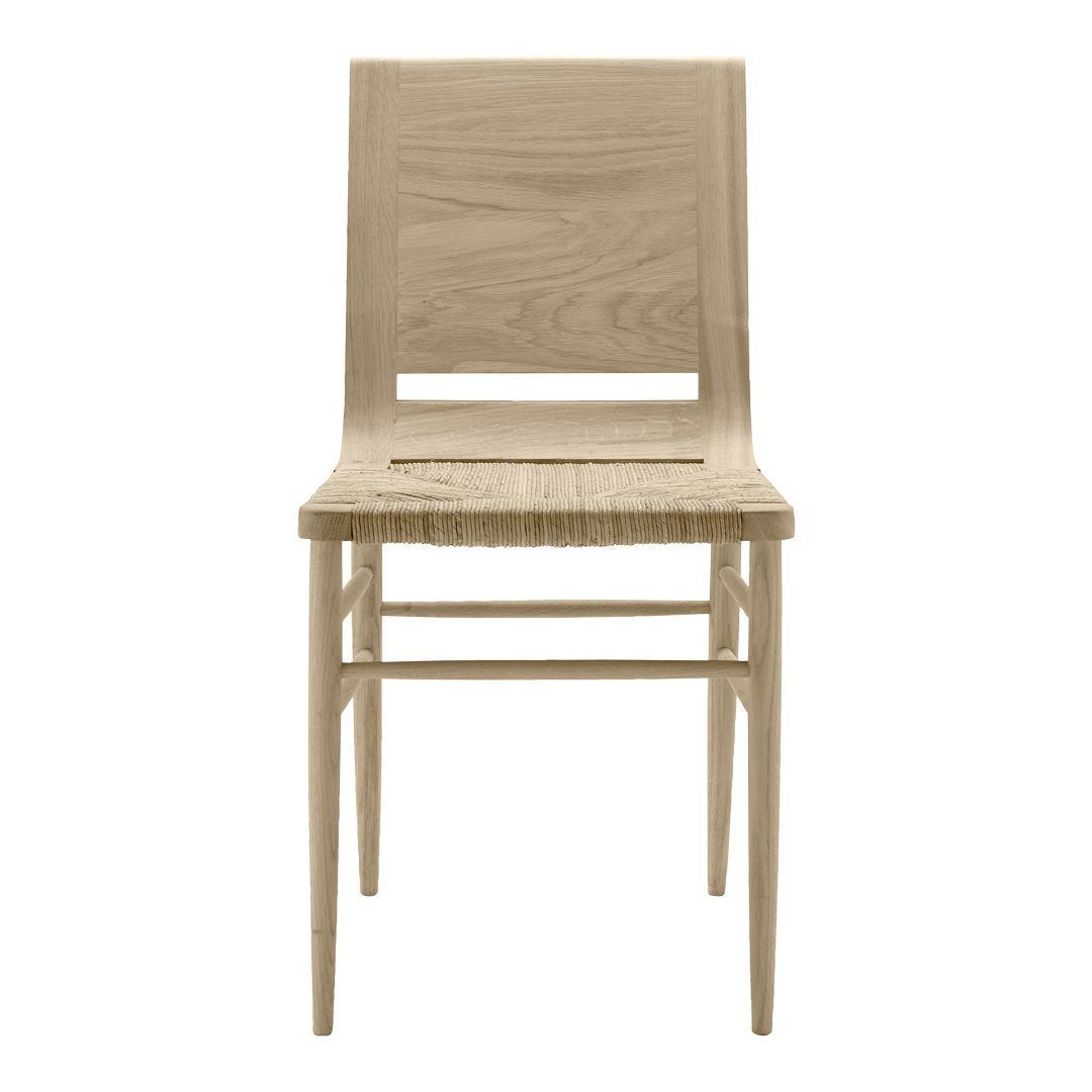 Light oak chair with a minimalist design and smooth wooden texture, showcasing natural wood grain patterns.