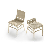 Beige wooden dining chairs with a simple geometric pattern on the seat and backrest. Elegant and minimalist design.