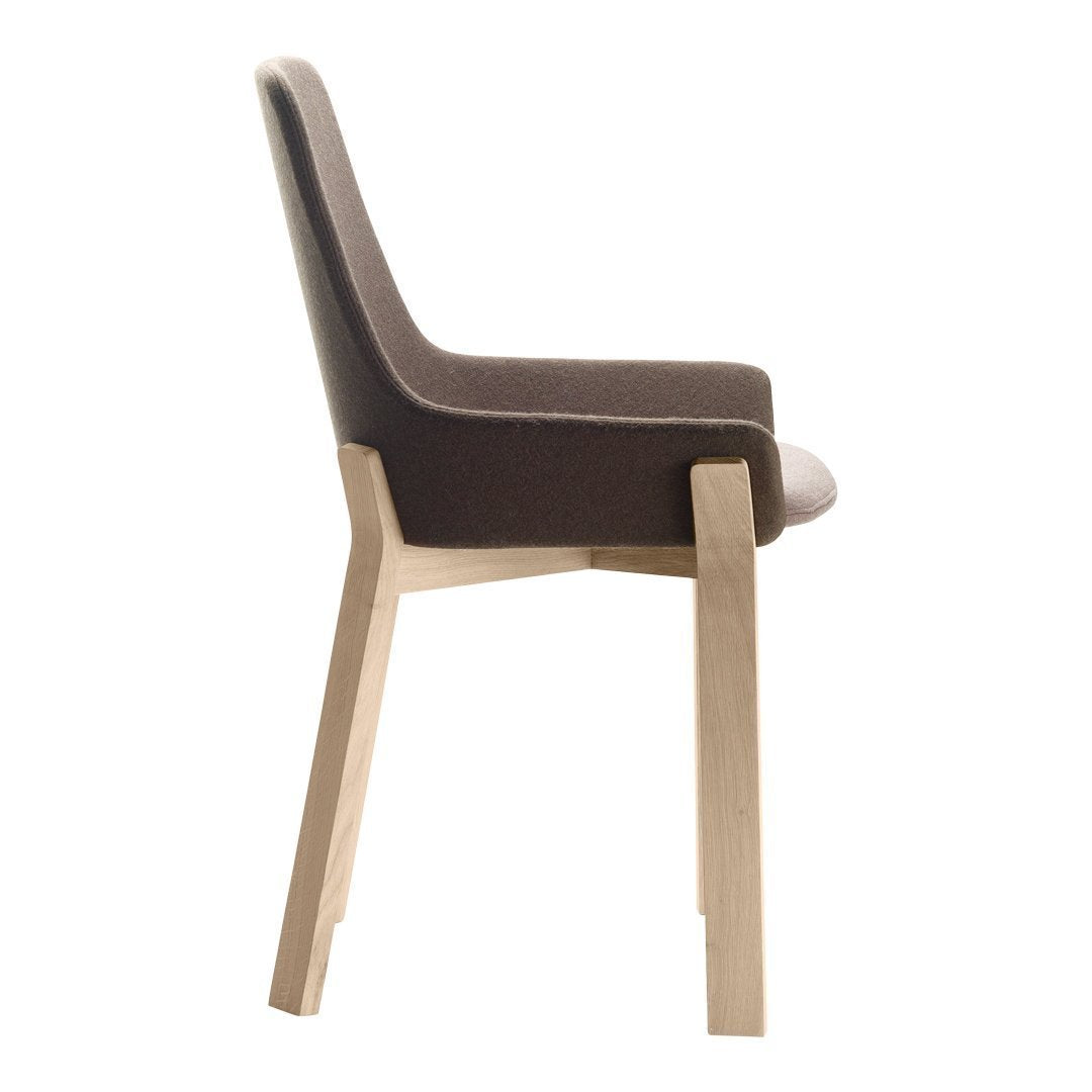 Brown upholstered chair with clean lines and natural wooden legs, showcasing a minimalistic design.