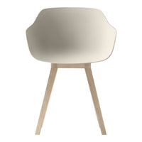 Light cream chair with smooth, minimalist design and wooden legs, perfect for modern styling.