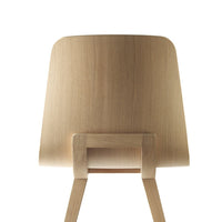 Light oak wooden chair with a smooth, natural finish and minimalist design; simple lines and elegant silhouette.