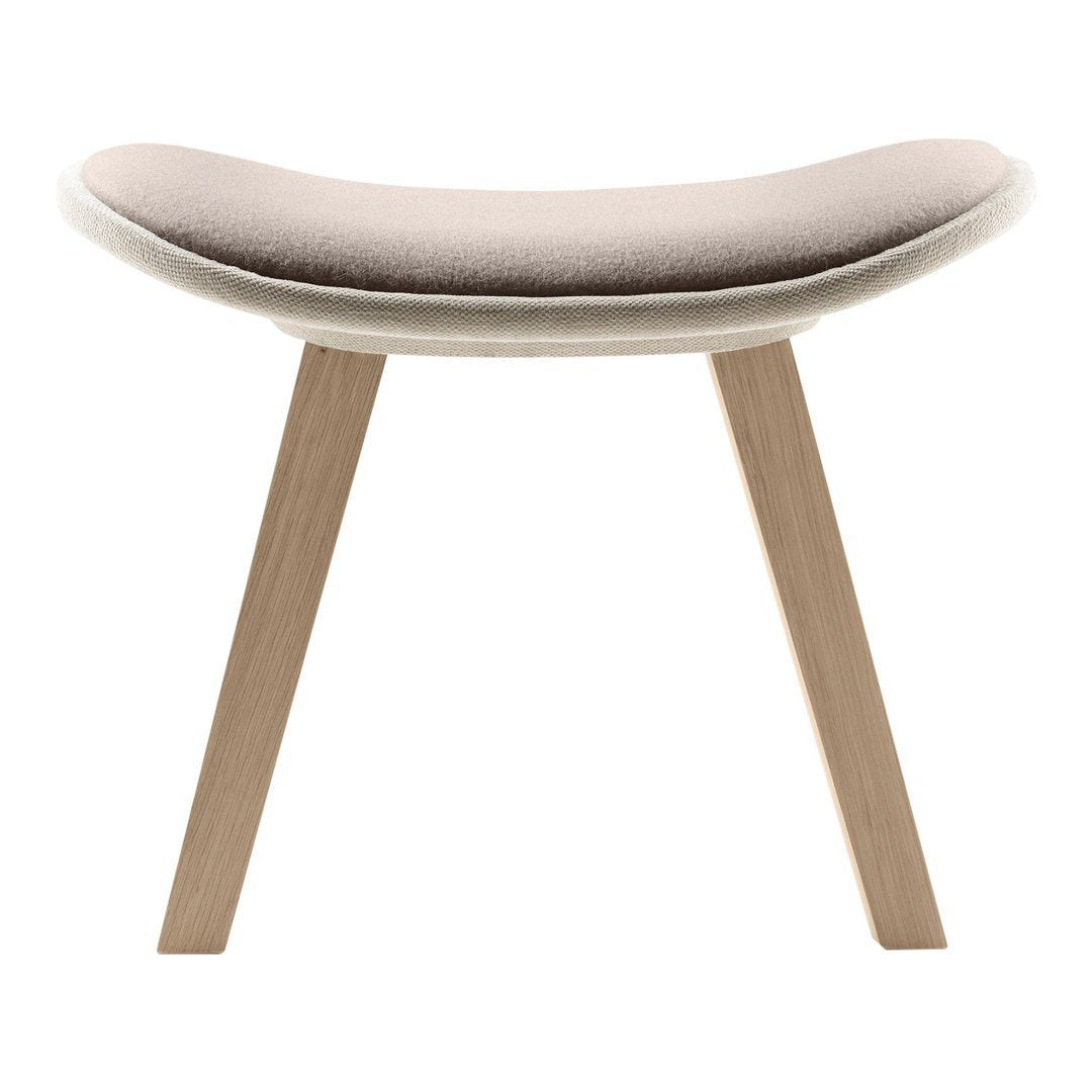 Soft beige upholstered stool with a smooth curved seat and natural wood legs, perfect for modern interiors.