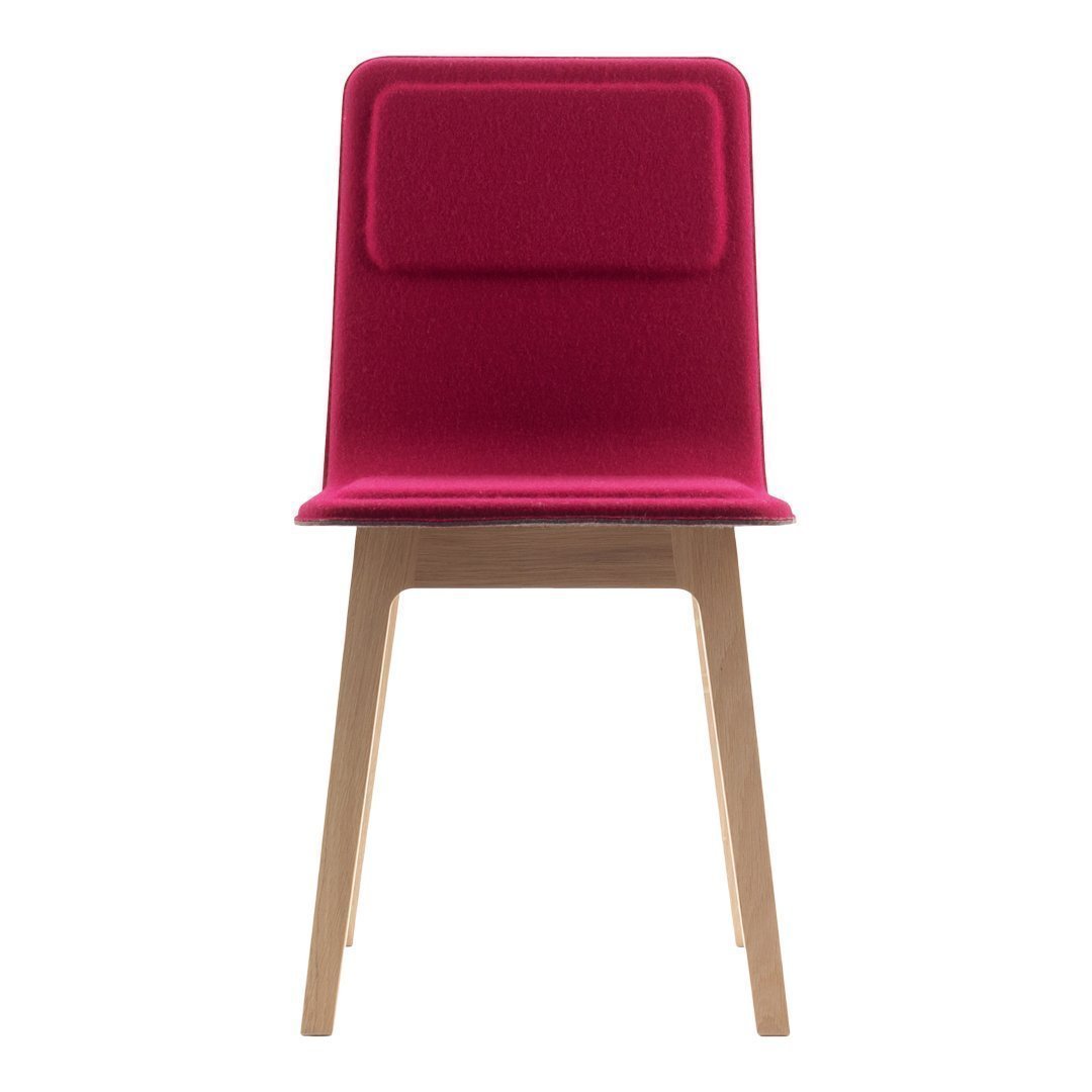 Vibrant fuchsia upholstered dining chair with a smooth wood base and simple, modern design. Ideal for contemporary spaces.