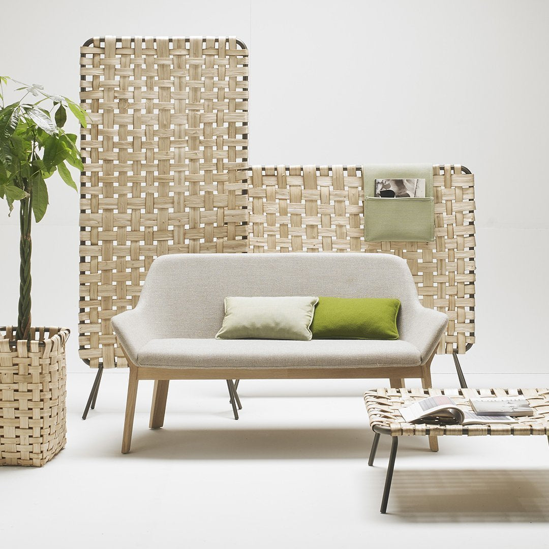 Natural woven textures in neutral tones, featuring soft beige, cream, and touches of green accents. Modern aesthetic.