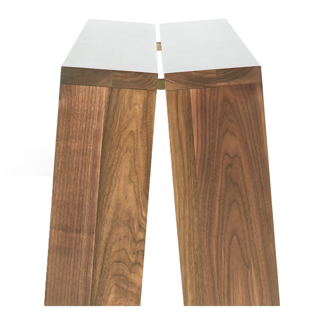 Wooden bench with a rich walnut finish and sleek white top, featuring a modern geometric design.