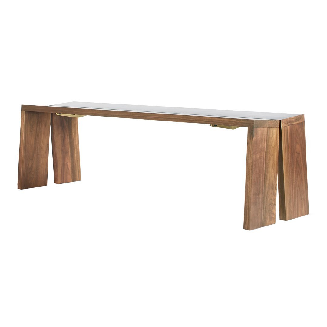 Sleek wooden bench in rich brown tones with a smooth, minimalist design and subtle grain patterns.