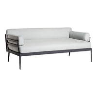 Modern white sofa with clean lines and sleek black metal frame, ideal for a minimalist decor.