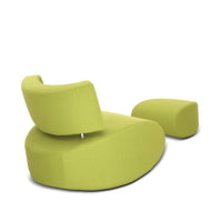 Lime green modern chair and ottoman with smooth, curved lines and a minimalist design. Perfect for contemporary decor.