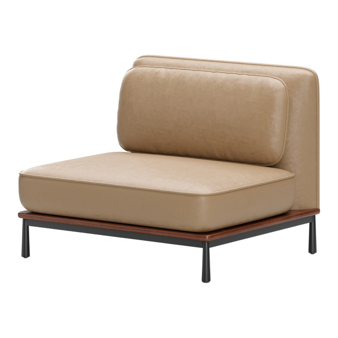 Beige leather armchair with a smooth texture and dark wood base, minimalistic design.
