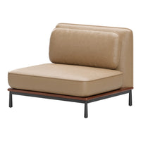 Beige leather armchair with a smooth texture and dark wood base, minimalistic design.