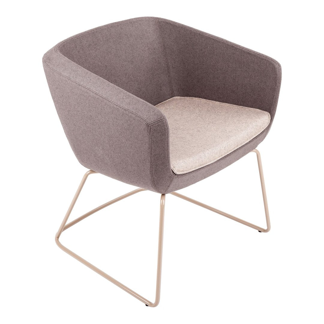 Gray upholstered armchair with a light beige seat cushion and a sleek metal base. Modern and minimalist design.