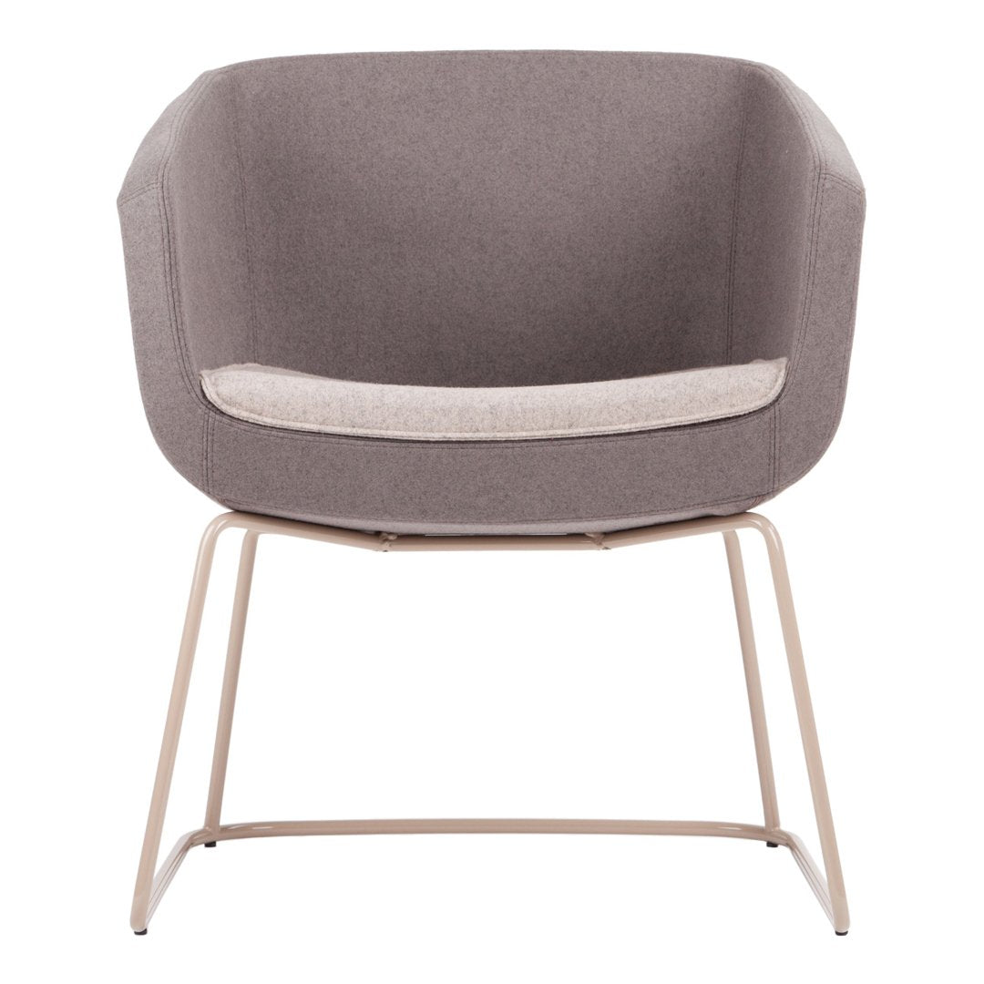 Gray upholstered chair with a smooth fabric finish and a light beige seat cushion. Minimalist metal legs in a neutral tone.