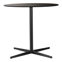 Round black table with a smooth surface and sleek black metal base design, perfect for modern decor.