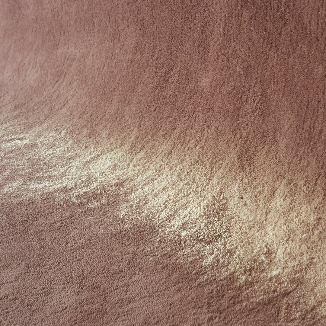 Soft beige and rose gradient with subtle texture, creating an elegant and calming pattern.