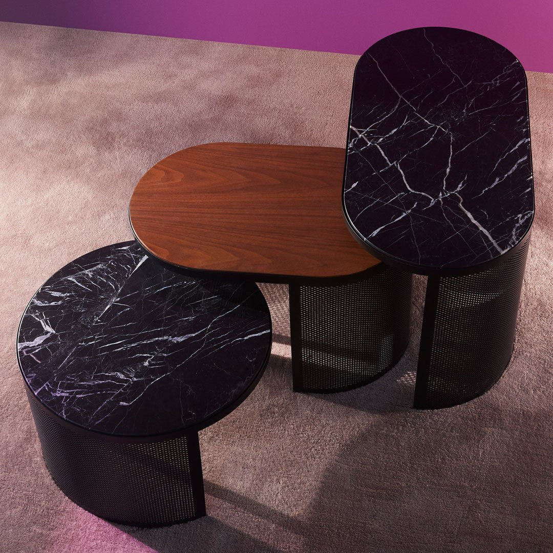 Set of three modern side tables featuring black marble and walnut finishes, with sleek metal frames. Stylish and contemporary.