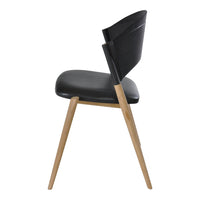 Black upholstered chair with sleek design and natural wood legs, showcasing minimalistic and modern aesthetics.