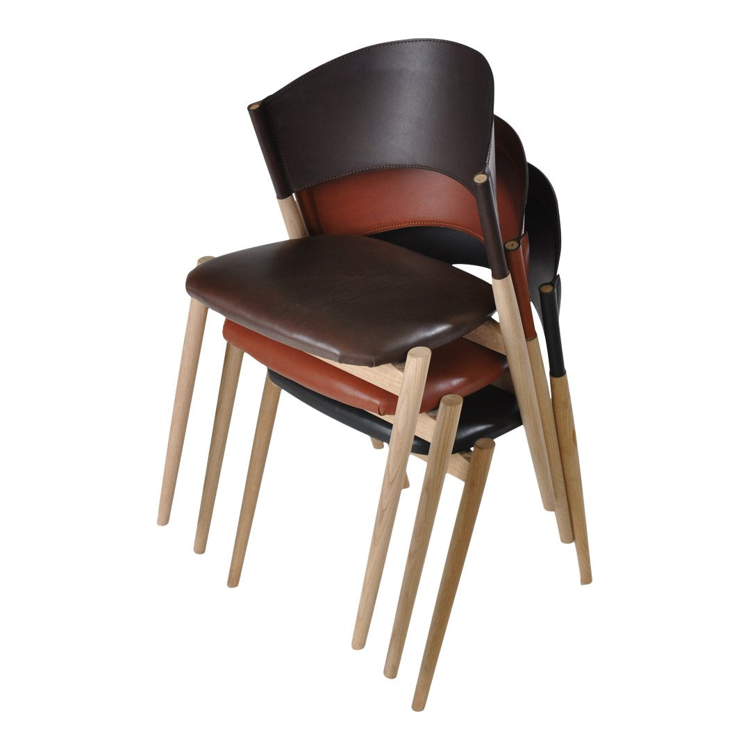 Stacked chairs featuring dark brown and warm reddish upholstery with smooth light wood legs.