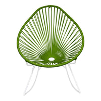 Green leaf-shaped chair with radial pattern and white metal legs. Perfect for modern outdoor or indoor decor.