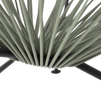 Light sage green strands radiate from a black base, creating a sleek, modern look. Perfect for contemporary decor.