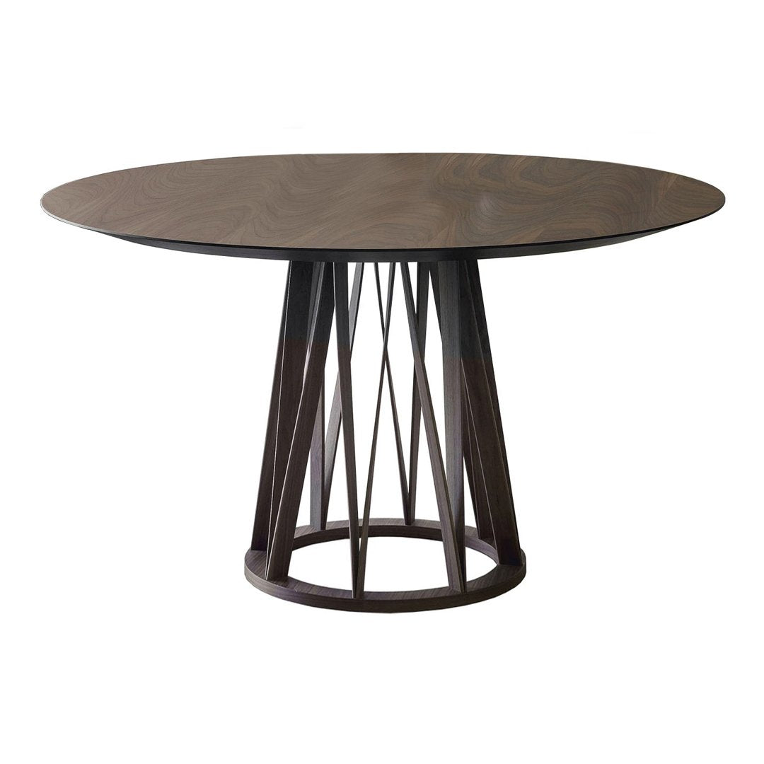 Round dark wood dining table with a sleek geometric base in a rich brown finish, showcasing modern design aesthetics.