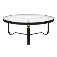 Stylish round coffee table with a sleek black metal frame and clear glass top, featuring elegant gold accents.