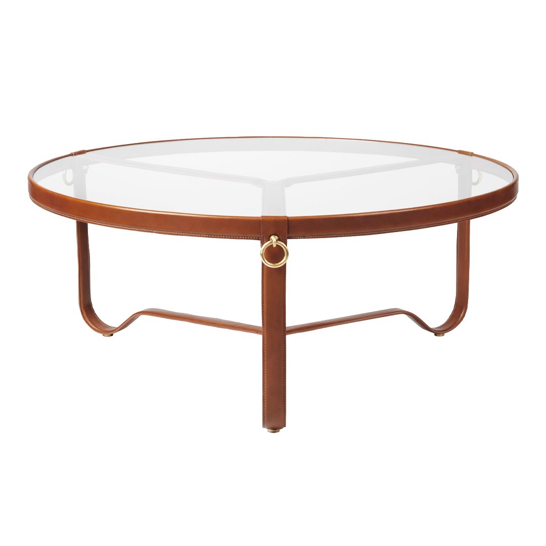 Round coffee table with a sleek glass top and warm brown wooden frame, featuring a subtle gold accent.