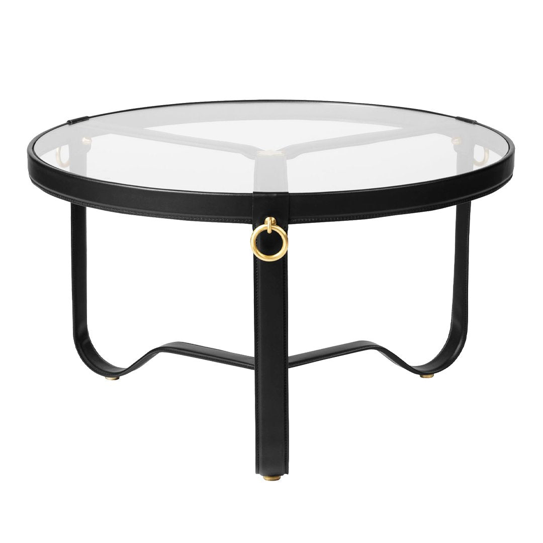 Round coffee table with a sleek black metal frame and a clear glass top, featuring elegant gold accent details.