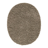 Cozy oval rug in soft taupe shade with a textured, shaggy pattern for added warmth and comfort.
