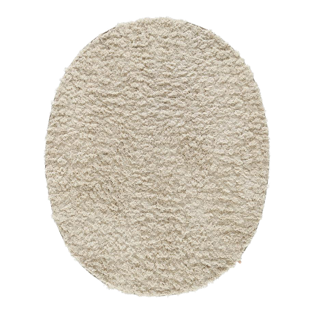 Soft beige oval rug with a textured, plush surface, perfect for adding warmth to any space.