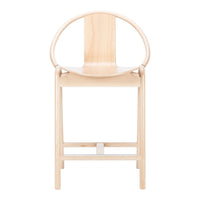 Natural wood chair with a minimalist design featuring smooth, light-colored wood and a circular backrest.