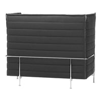 Black padded privacy screen with horizontal stitching and metallic frame, perfect for modern workspaces.