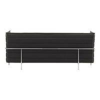 Black upholstered sofa with horizontal stitching, featuring a sleek chrome frame for a modern look.