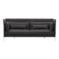 Elegant black sofa with smooth fabric and minimalist design, featuring matching cushions for a cohesive look.