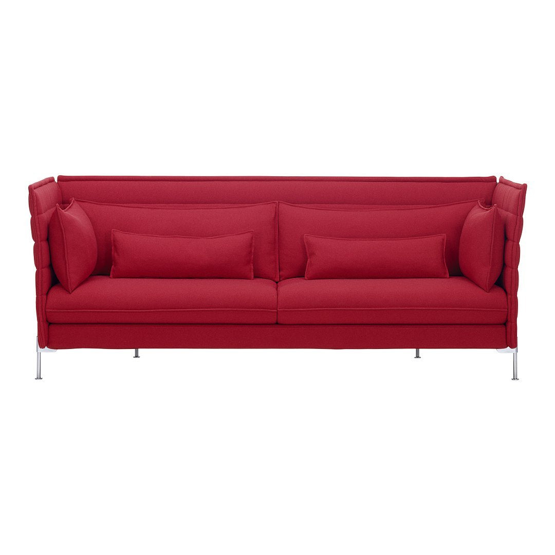 Bright red modern sofa with a textured fabric and sleek silver legs, featuring plush cushions for added comfort.