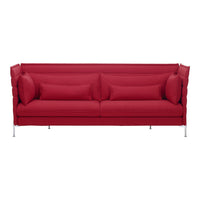 Bright red modern sofa with a textured fabric and sleek silver legs, featuring plush cushions for added comfort.
